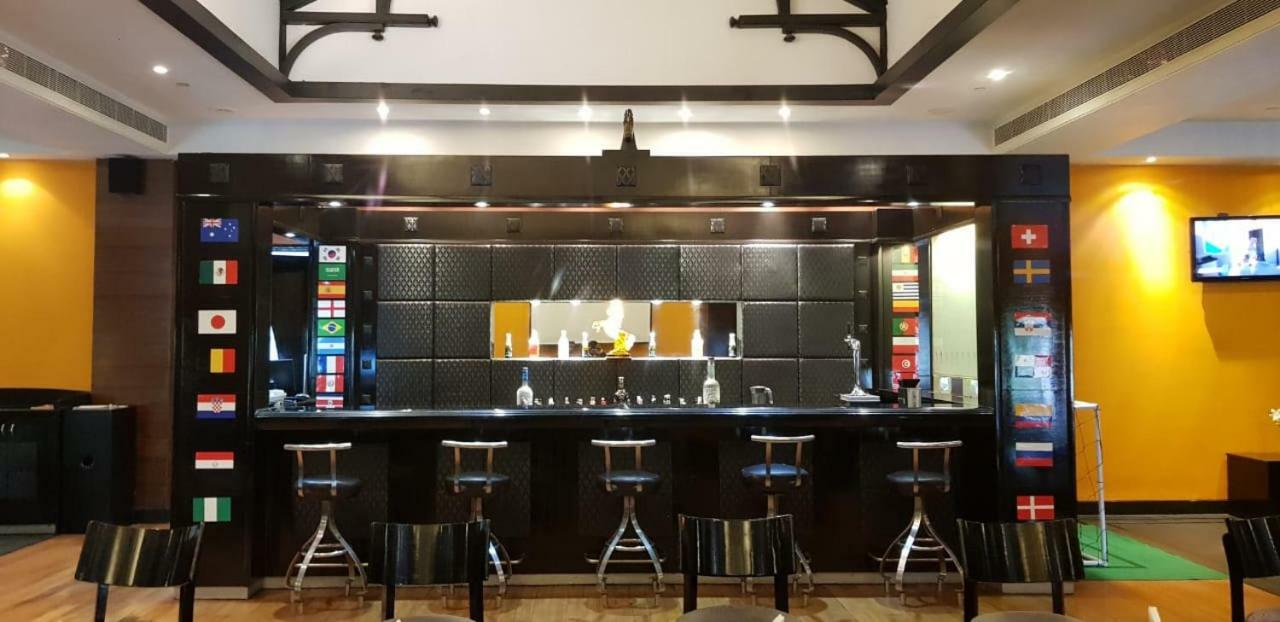 Greenpark Csennai Kültér fotó A coffee bar in a coffee shop