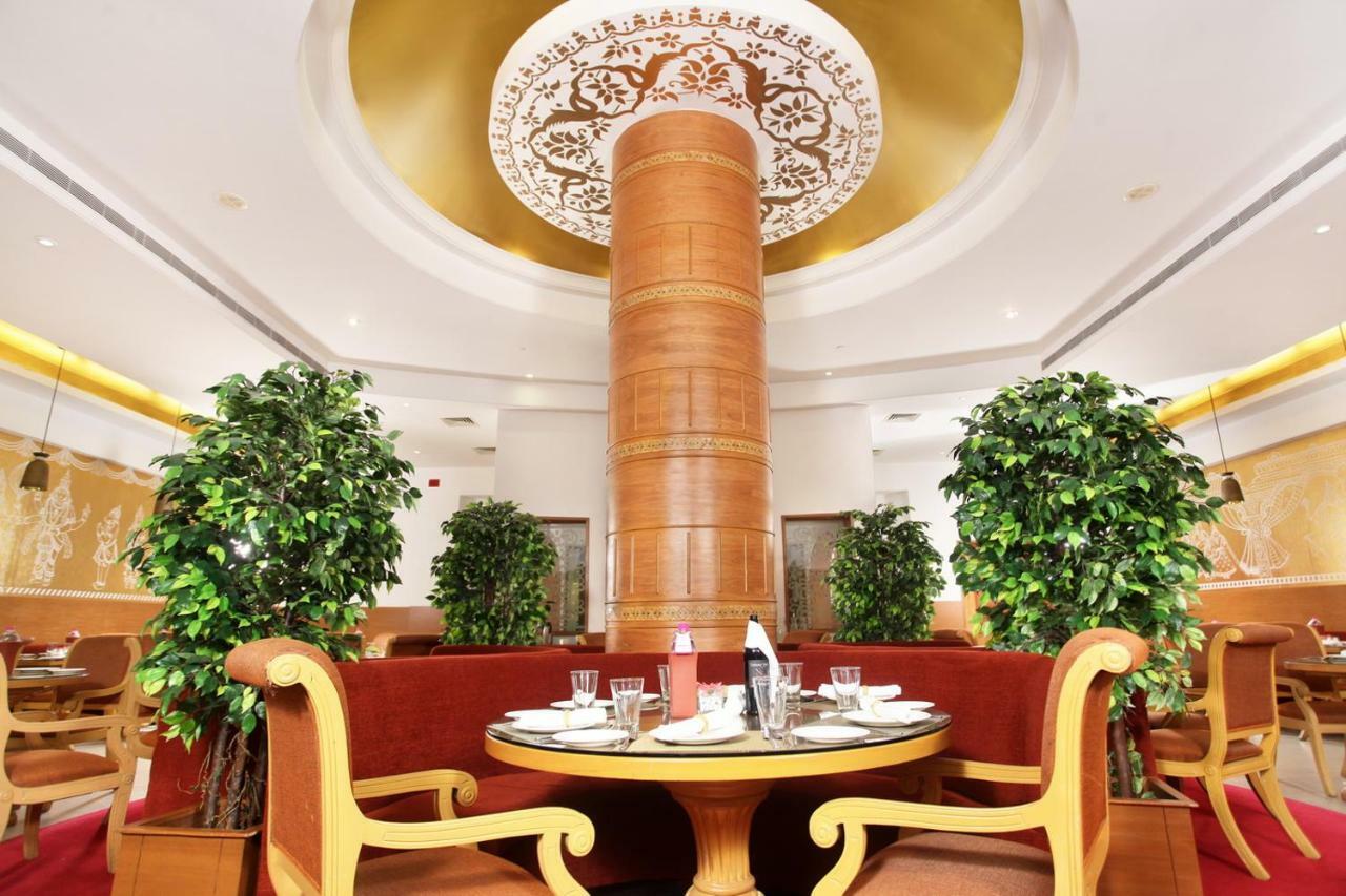 Greenpark Csennai Kültér fotó The interior of the restaurant